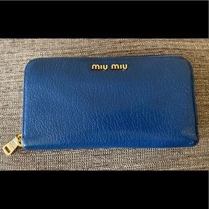 Authentic Miu-Miu Zippy Leather Textured Wallet